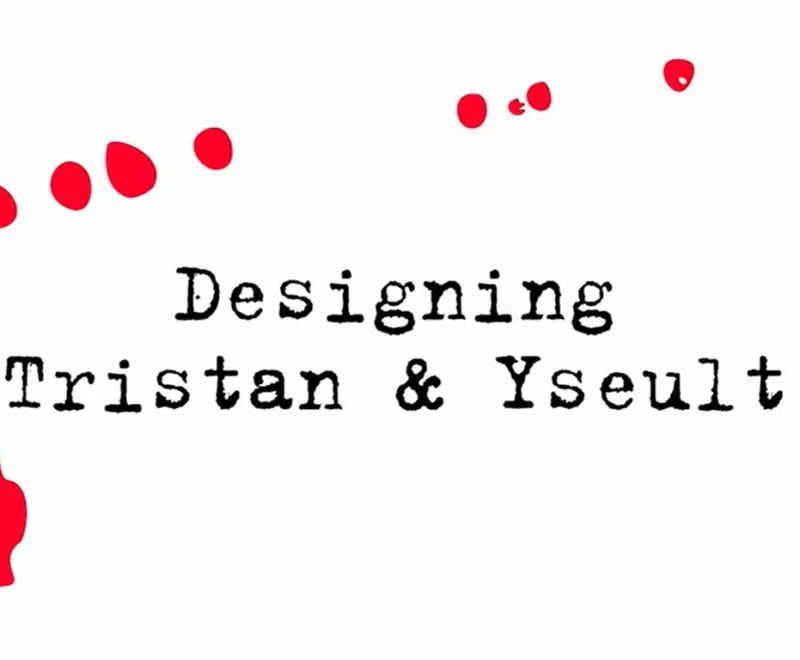 The words 'Designing Tristan and Yseult' in black typewriter style font is centered in the image. A red mark, as if a splash of ink,