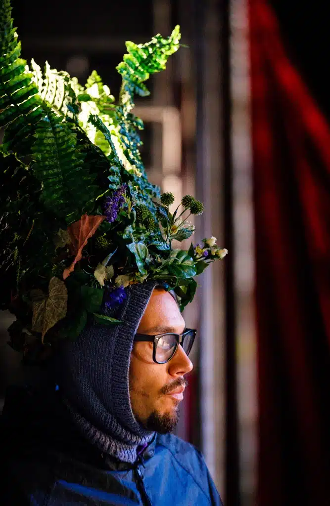 A love spotter featured with a large foliage arrangement on his head