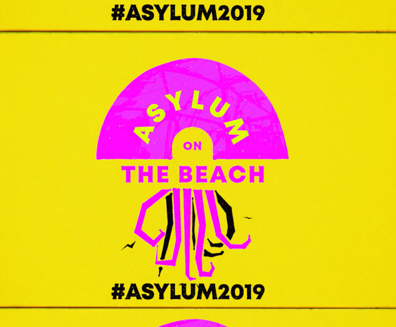 An illustration of a pink Jellyfish set against a bright yellow background. There is Yellow and Black text on and around illustration reading 'Asylum on the beach #Asylum2019.