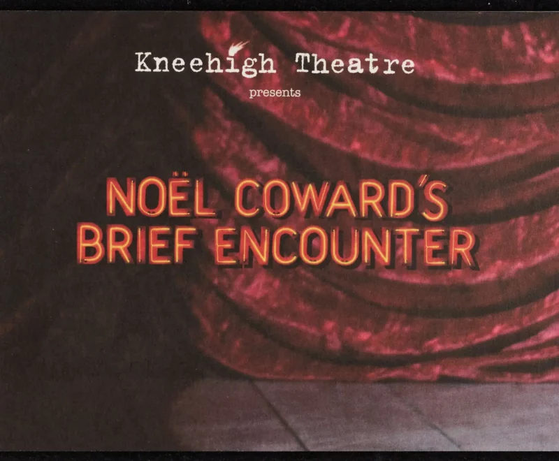 The image features the text reading 'Noel Coward's Brief Encounter' in a bold neon font set against the backdrop of a red velvet stage curtain. The logo of Kneehigh Theatre is presented in the top middle in a white typewriter font.