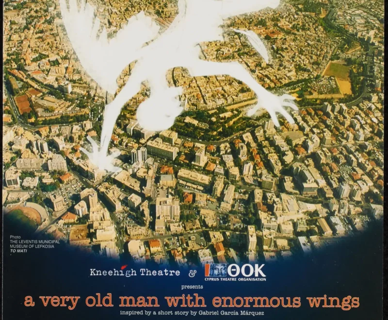 The image features a bright white illustration of a man with wings falling through the sky. This image is set against a circular top down image of a city. The production title is presented at the bottom of the page reading 'A Very Old Man with Enormous Wings'.