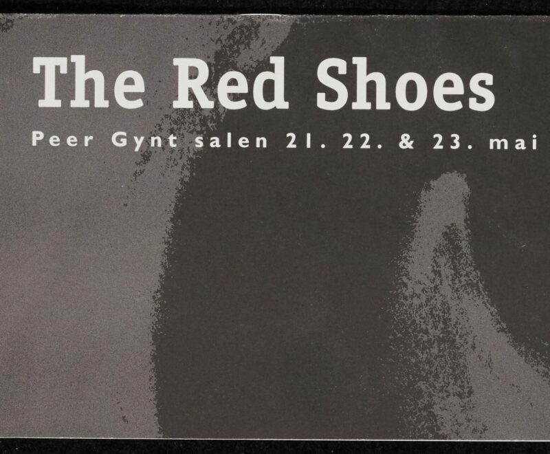 Front cover of the programme for Red Shoes 2003 performance in Bergen in Norway. On the top of the page there is a grey banner reading 'De 51. Festspillene i Bergen 2003'. This translated to English reads 'The 51st Bergen Festival 2003'. On the left hand side of the cover is text in english written vertically reading 'The Red Shoes: Peer Gynt salen 21. & 23. mai kl. 20:00. This translated to English reads 'Peer Gynt hall 21 & 23 May at 20:00.' This text is set against a black and grey background with a swirly pattern.