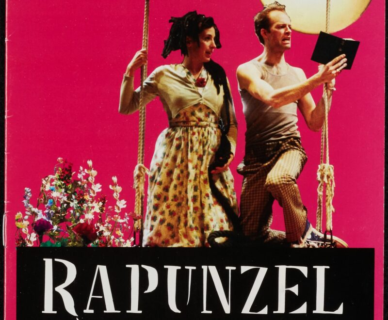 The programme cover features a production image of two characters in costume superimposed against a bright pink backdrop. There is text on the top of the page reading 'New Vic Bill, The New Victory Theatre on the New 42nd Street. At the bottom of the page 'Rapunzel' is written in a curly white font set against a black backdrop.