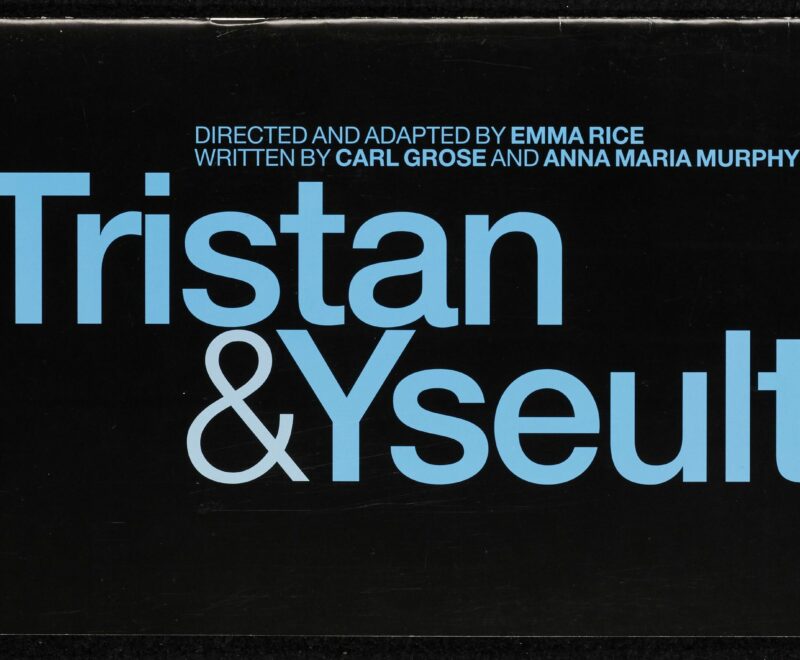 Image features the production title 'Tristan and Yseult' written in a bold blue text set against a black backdrop.